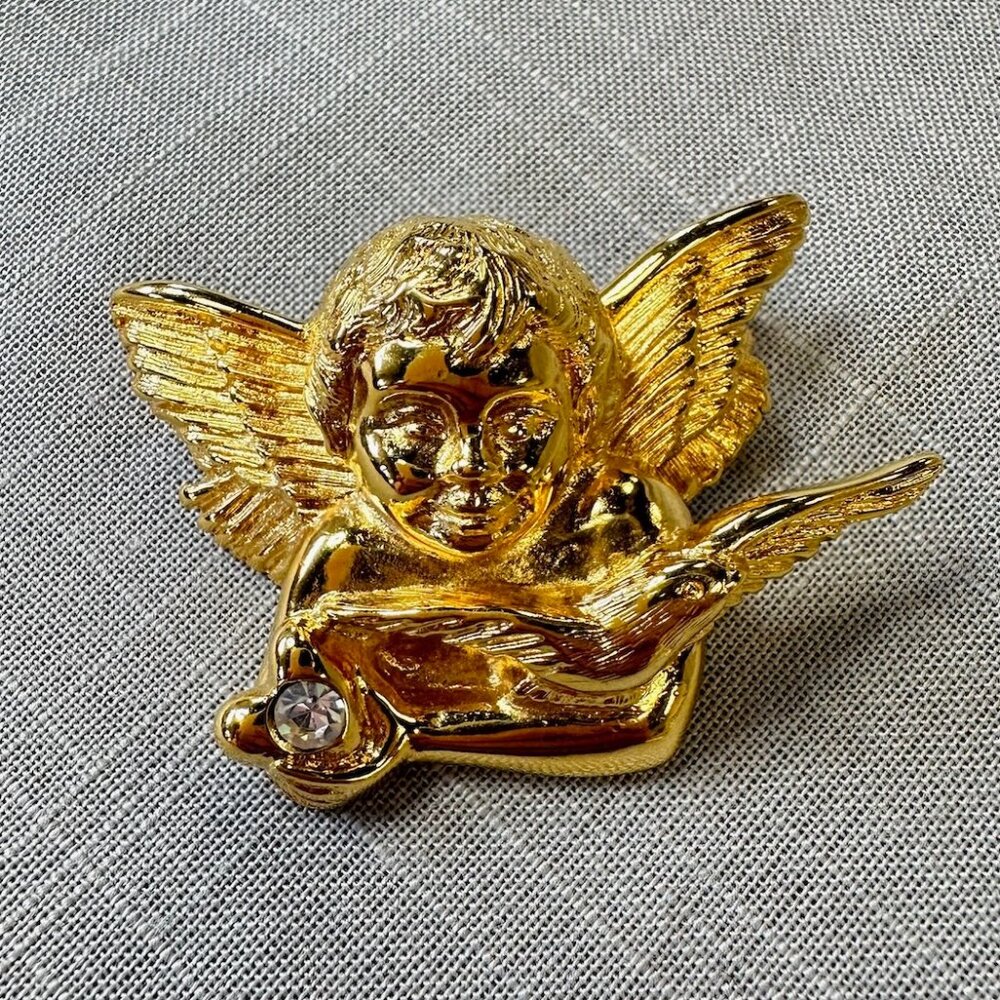 Vintage Monet Cherub Holding Dove and Crystal Brooch